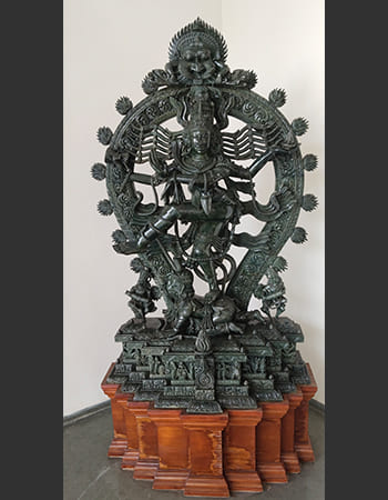 Corporate building facade stone work featuring geometric and floral patterns