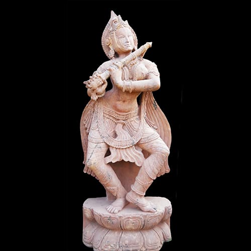 Elegant Devadasi dancing lady sculpture in sandstone, showcasing traditional Indian classical dance pose with intricate carved details