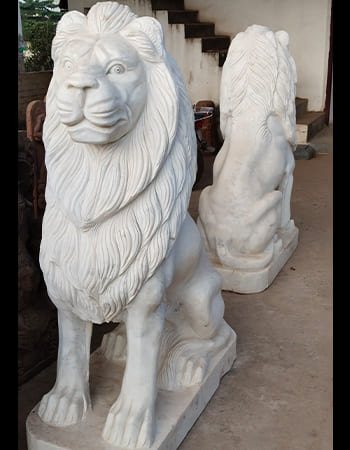 Traditional marble ceremonial vessel with carved handles and devotional patterns for temple rituals