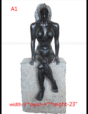 Elegant pink marble Balabhadra sculpture featuring detailed facial expressions and traditional ornamental patterns