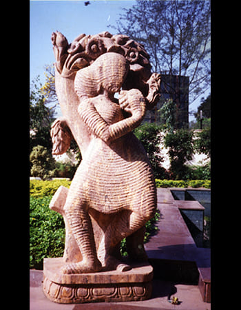 Decorative marble architectural element with pillar design and traditional Kalinga temple motifs