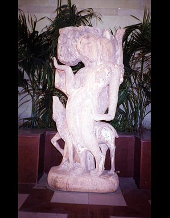 Serene white marble Shiva sculpture in meditation pose with traditional third eye and serpent details